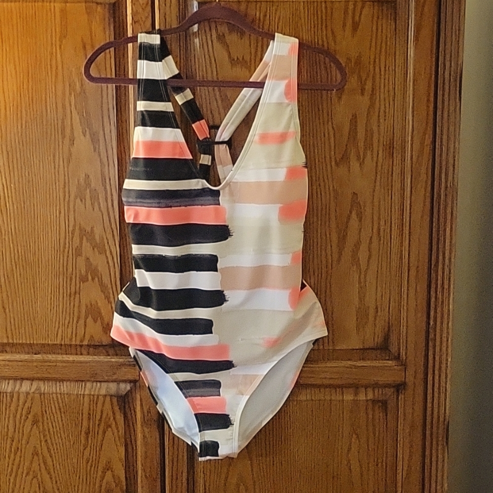 Mynah Bathing suit. Figure flattering one piece. NWT